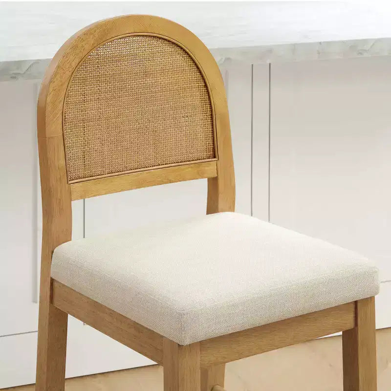 Tabouret de comptoir bohème en rotin avec dossier incurvé et assise coussinée