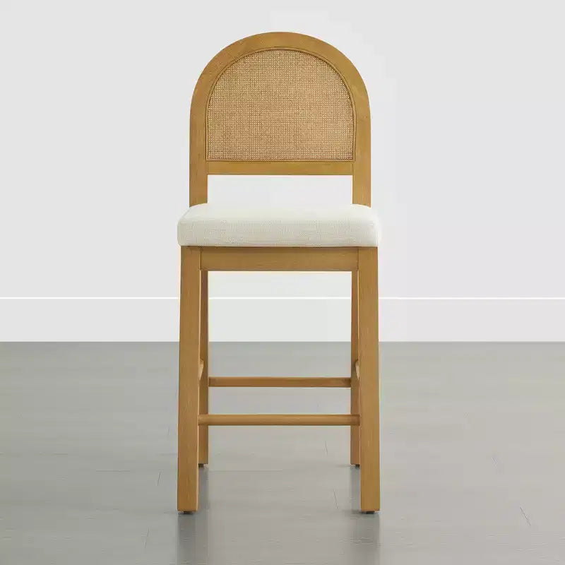 Tabouret de comptoir bohème en rotin avec dossier incurvé et assise coussinée