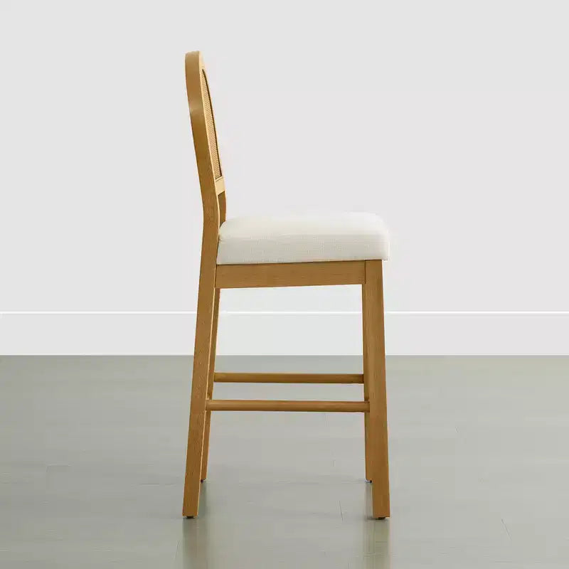 Tabouret de comptoir bohème en rotin avec dossier incurvé et assise coussinée