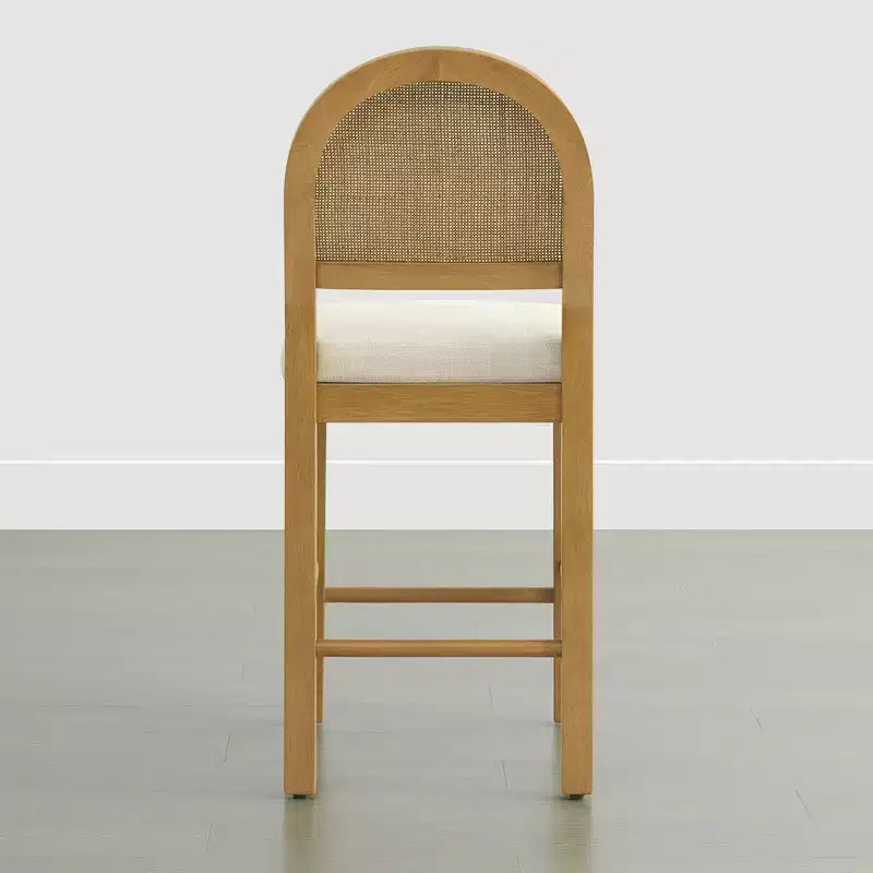 Tabouret de comptoir bohème en rotin avec dossier incurvé et assise coussinée
