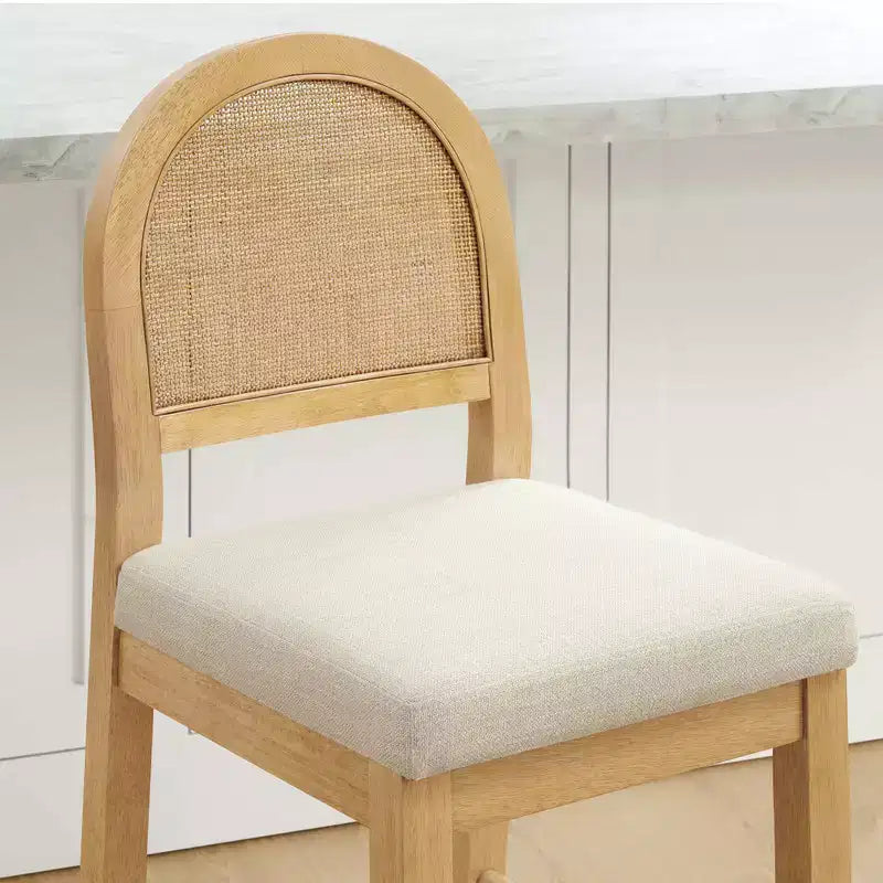 Tabouret de comptoir bohème en rotin avec dossier incurvé et assise coussinée