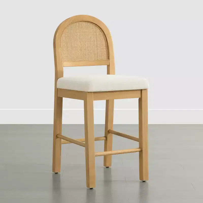 Tabouret de comptoir bohème en rotin avec dossier incurvé et assise coussinée
