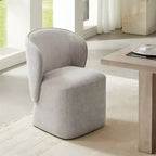 Chaise de salle à manger moderne avec roulettes et dossier enveloppant