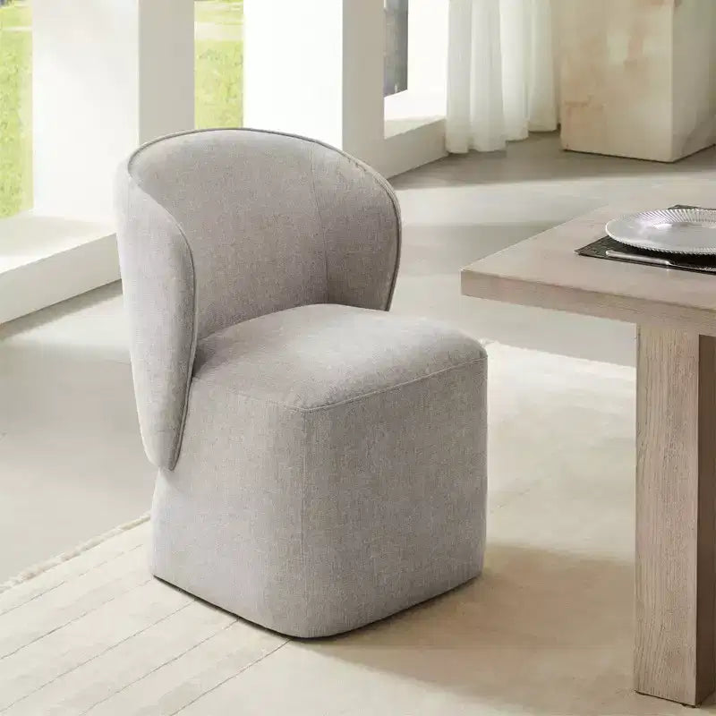 Chaise de salle à manger moderne avec roulettes et dossier enveloppant